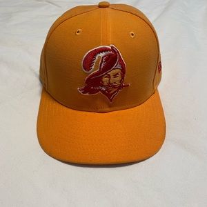 New Era Tampa Bay Buccaneers Hat. Orange creamsicle color. Size is a 7 1/4